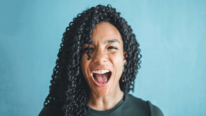 woman doing vocal warm ups before doing voice acting