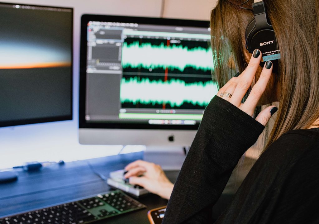 Girl listening to audio recording