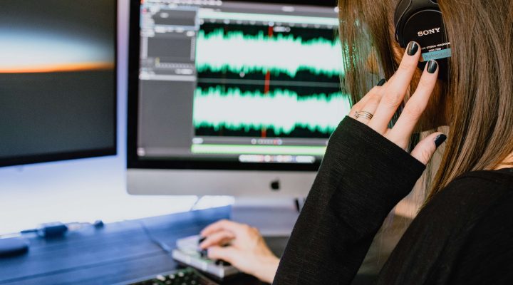 Girl listening to audio recording